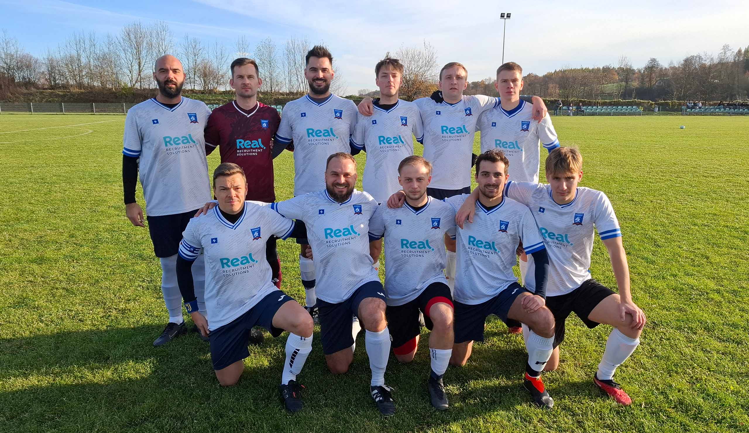 Krakow Dragoons FC players posing for a pre-match photo