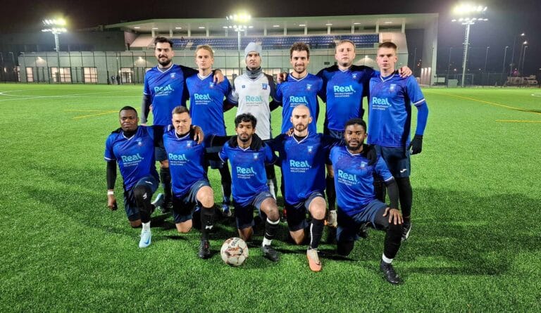 Krakow Dragoons FC players posing for a pre-match photo