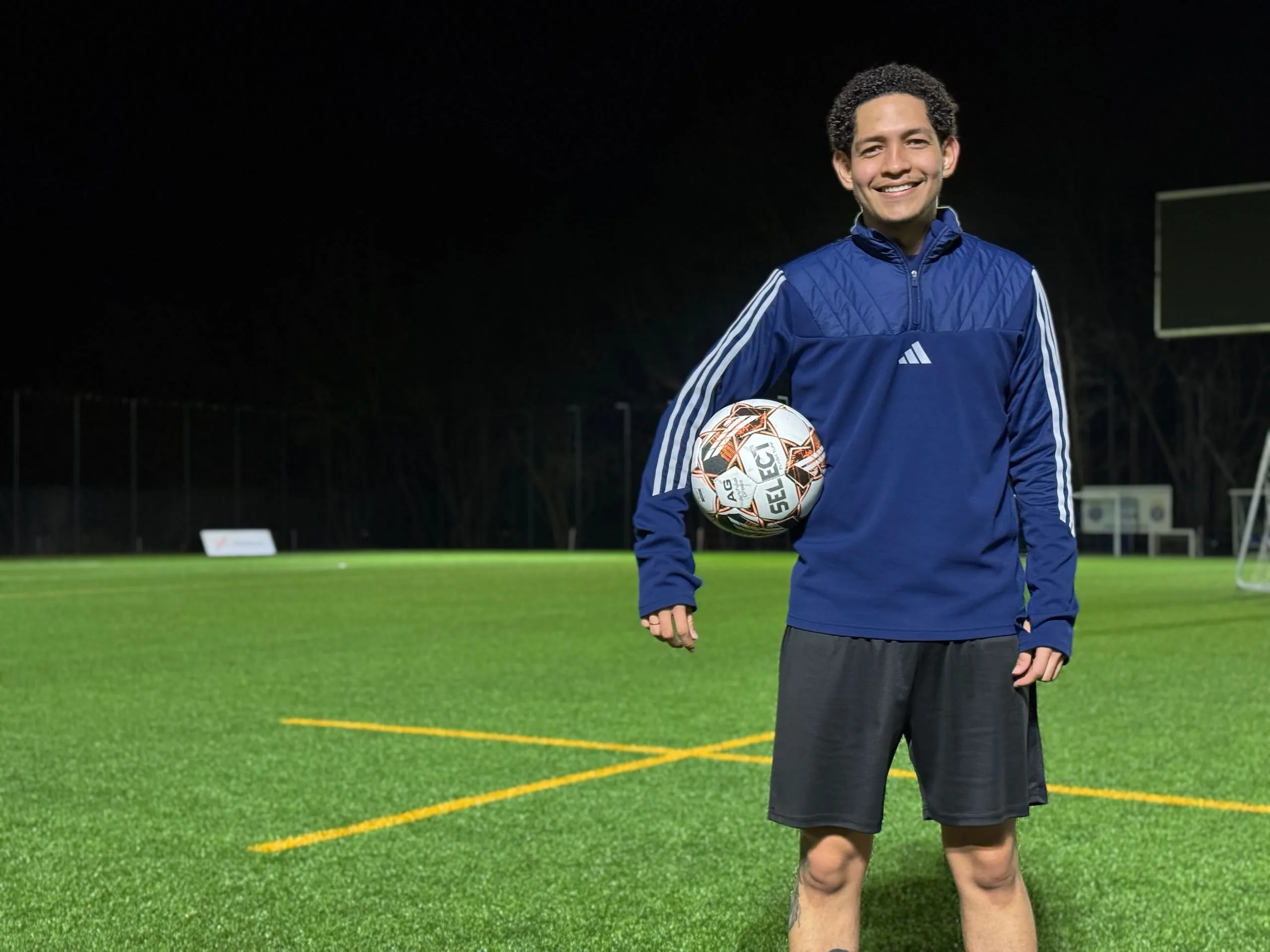 Stiven Campo of Krakow Dragoons FC posing for a photo with a ball under his arm