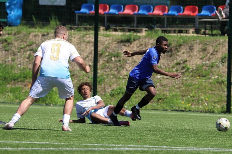Corneille Malonga of Krakow Dragoons FC dribbling past an opponent