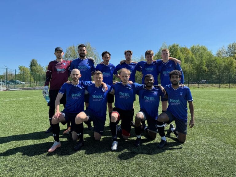Krakow Dragoons FC players posing for a pre-match photo