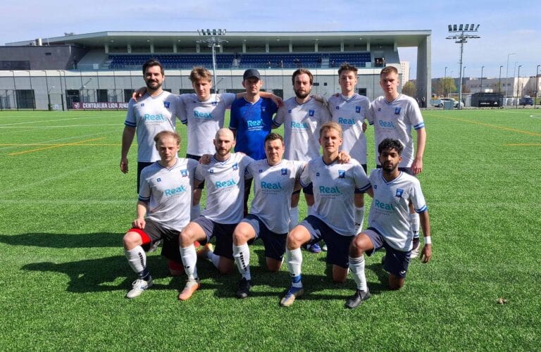 Krakow Dragoons FC players posing for a pre-match photo