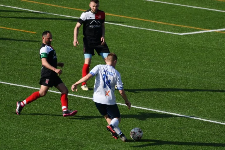 Roman Bilovol of Krakow Dragoons FC attempts a cross