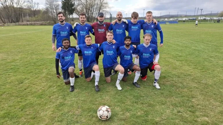 Krakow Dragoons FC players posing for a pre-match photo