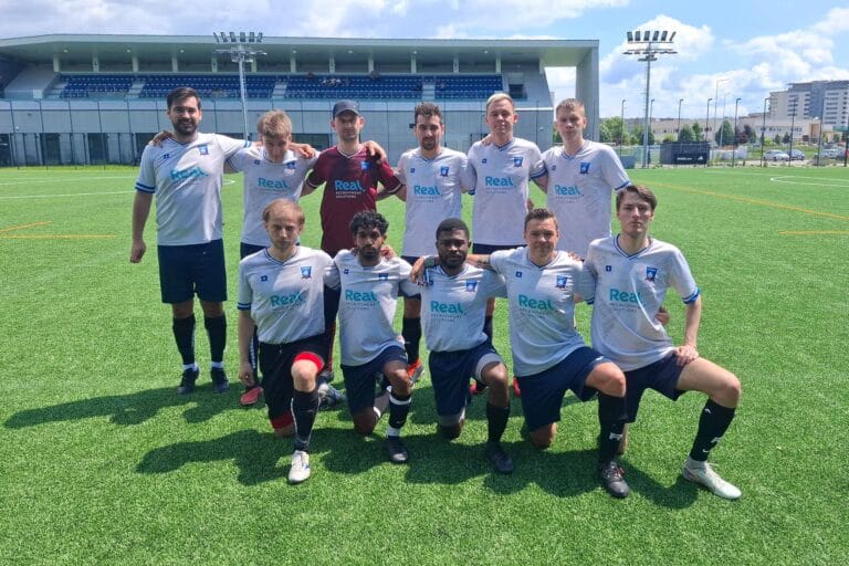 Krakow Dragoons FC players posing for a pre-match photo