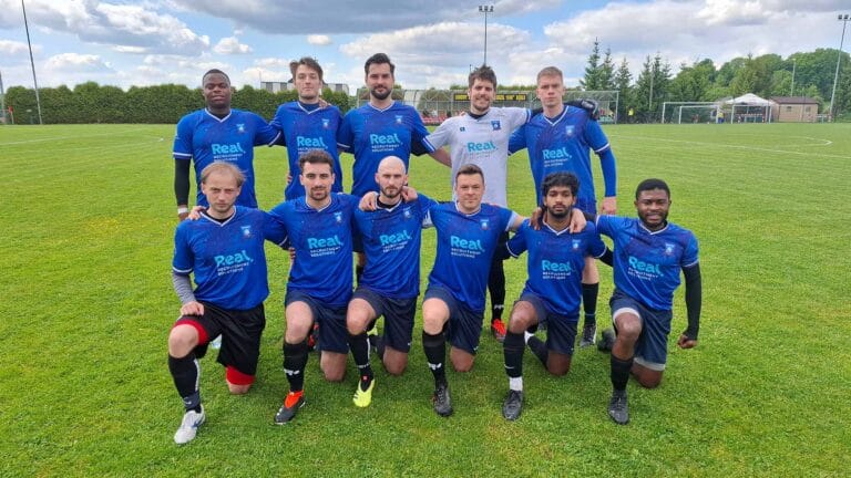 Krakow Dragoons FC players posing for a pre-match photo