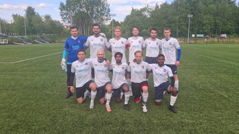 Krakow Dragoons FC players posing for a pre-match photo