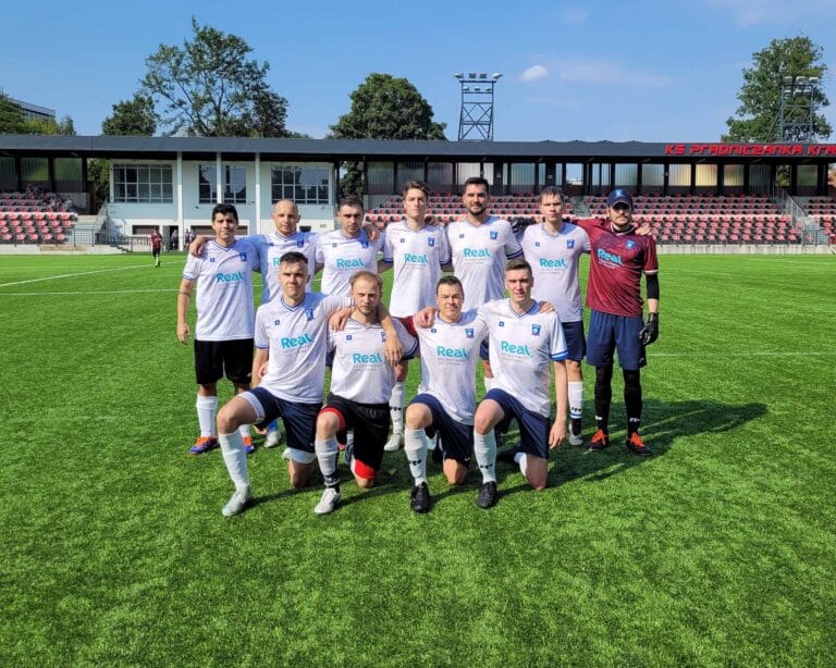 Krakow Dragoons FC players posing for a pre-match photo