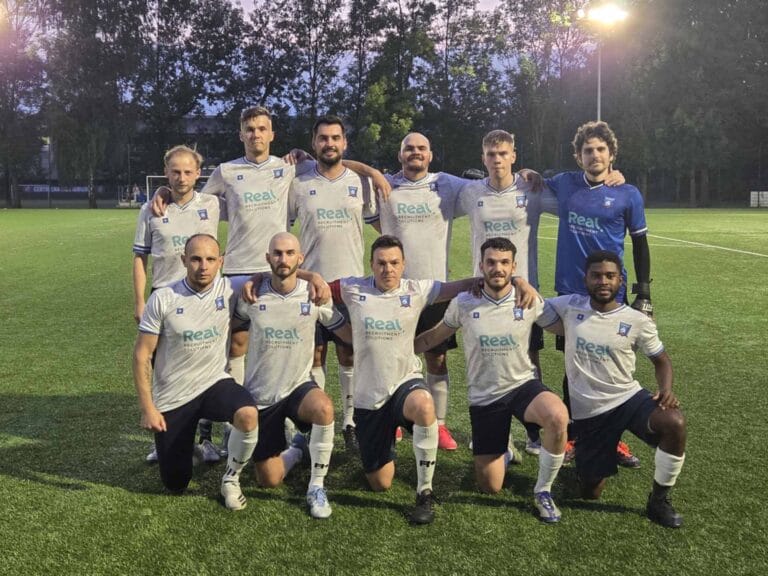 Krakow Dragoons FC players posing for a pre-match photo