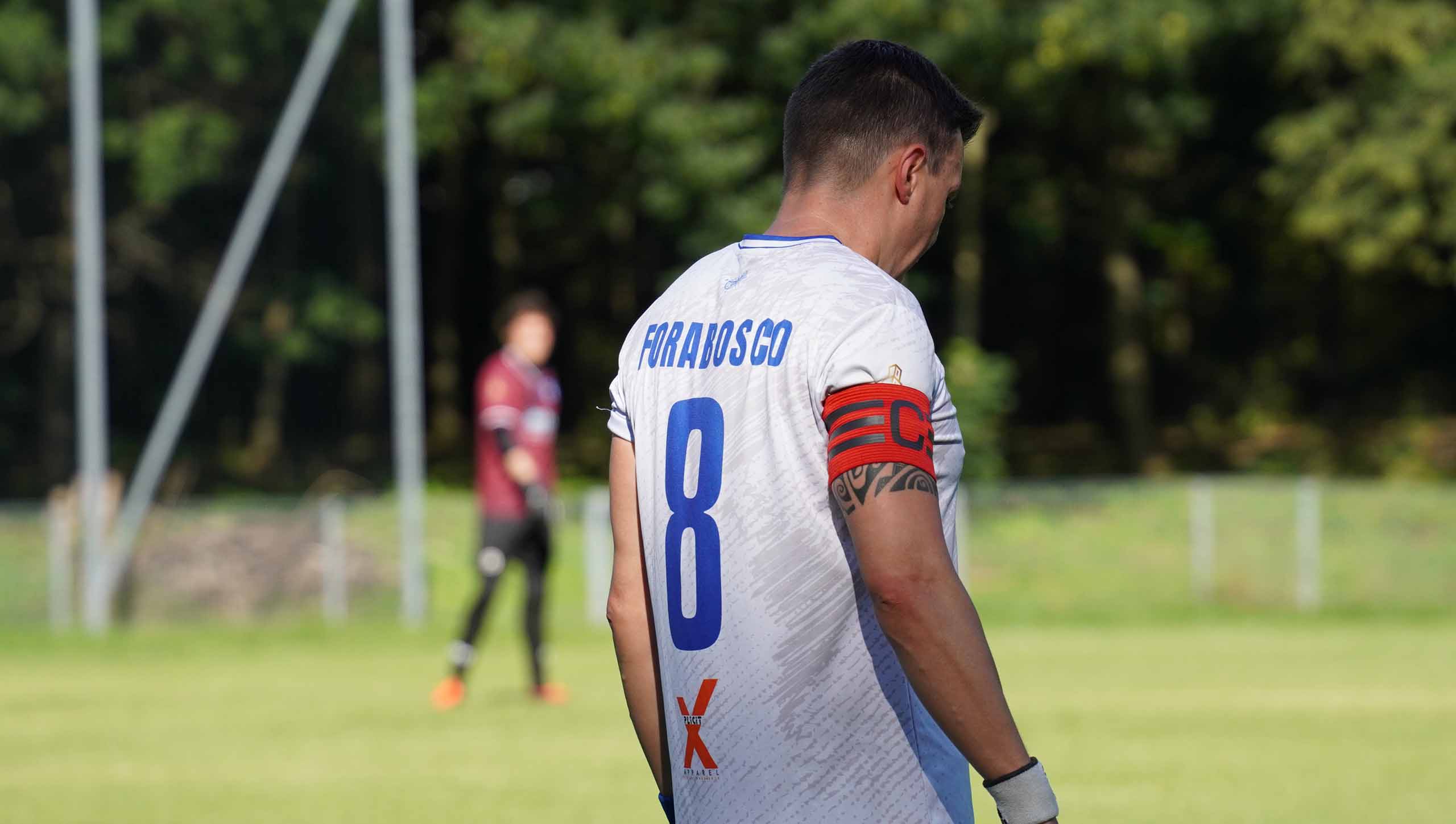 Enrico Forabosco of Krakow Dragoons FC wearing his captain armband during a match