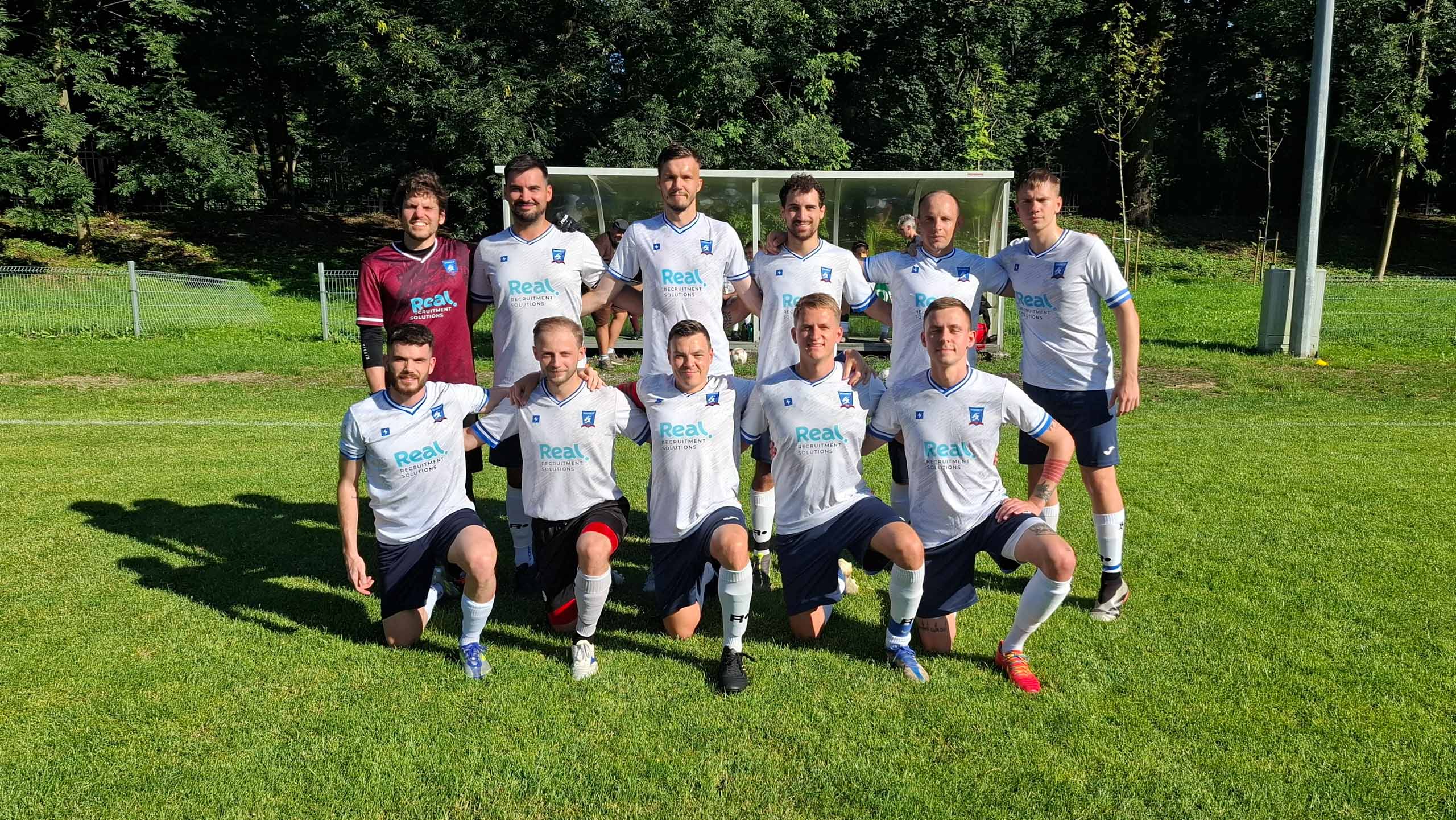 Krakow Dragoons FC players posing for a pre-match photo