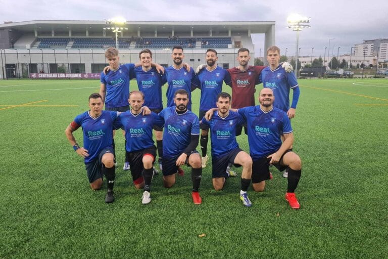 Krakow Dragoons FC players posing for a pre-match photo