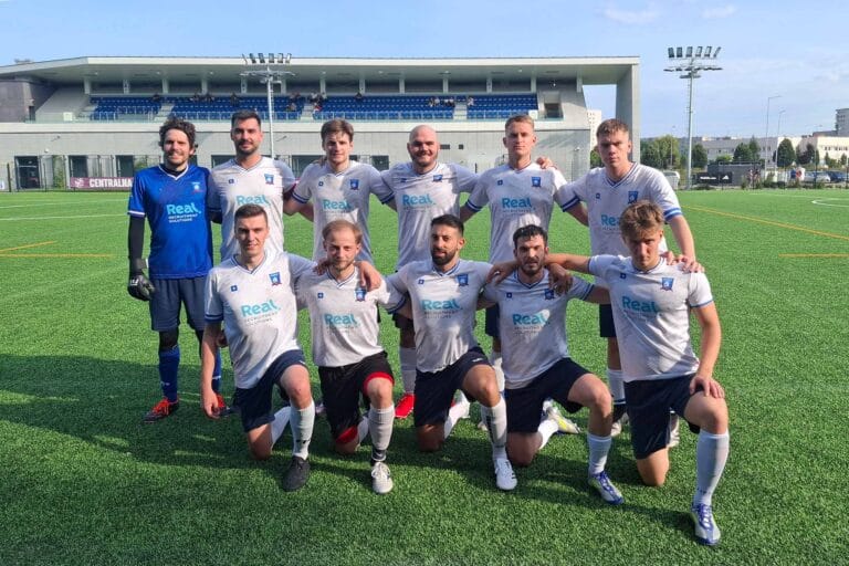 Krakow Dragoons FC players posing for a pre-match photo