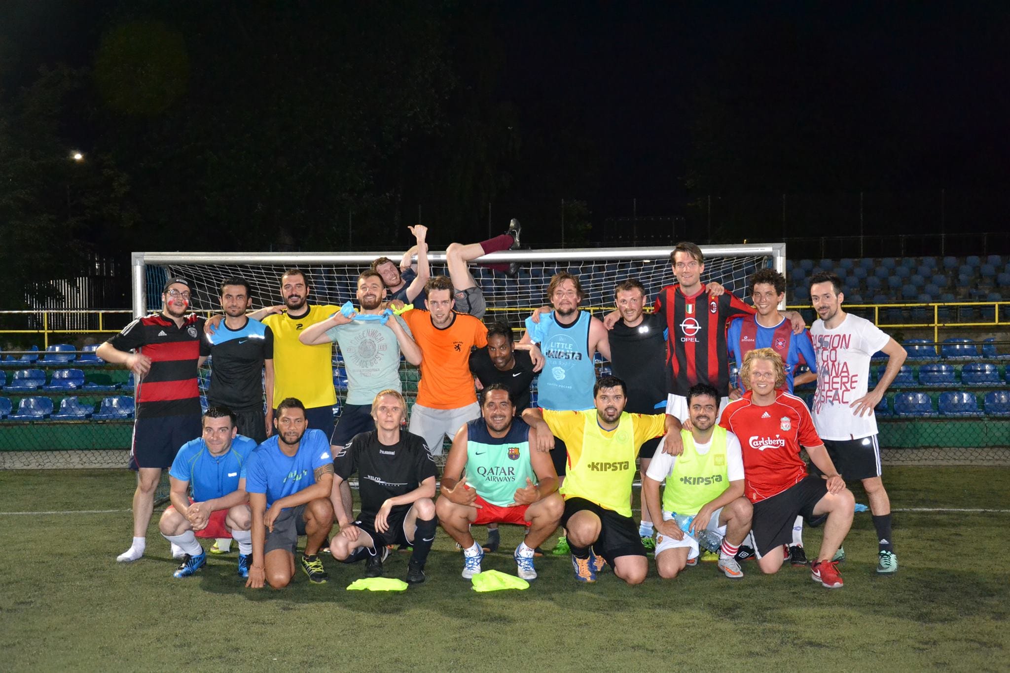 "Krakow Football" Facebook group players posing for a fun picture after a regular weekly kickabout