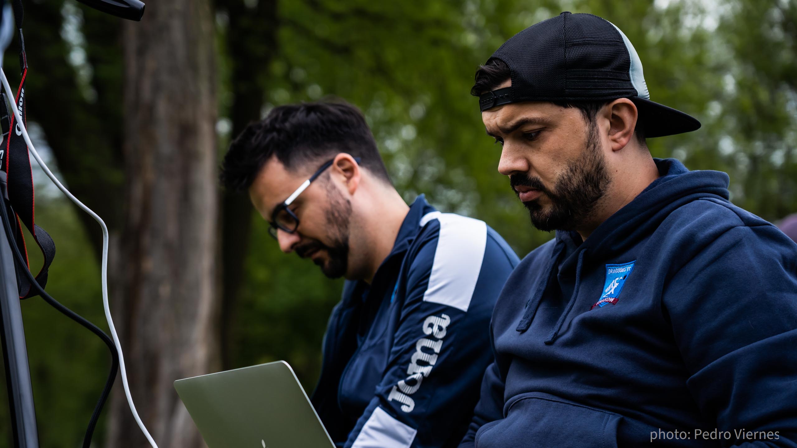 Diego Villanueva and Alex Băcica of Krakow Dragoons FC doing admin work during a match