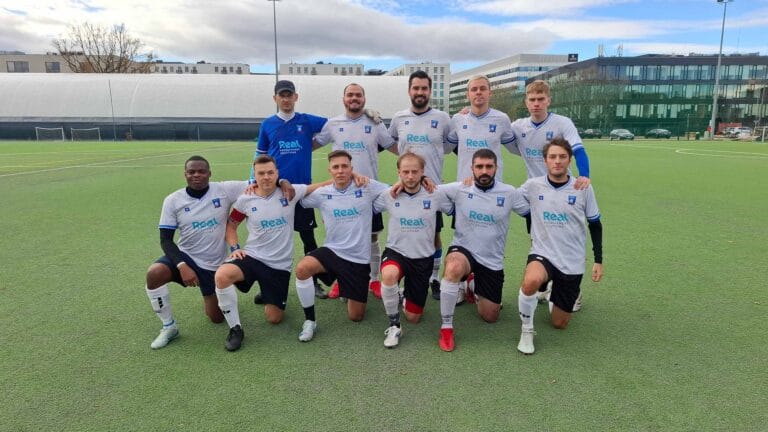 Krakow Dragoons FC players posing for a pre-match photo