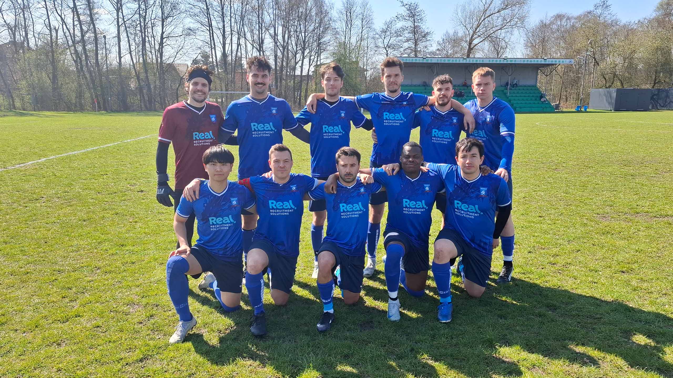 Krakow Dragoons FC players posing for a pre-match photo