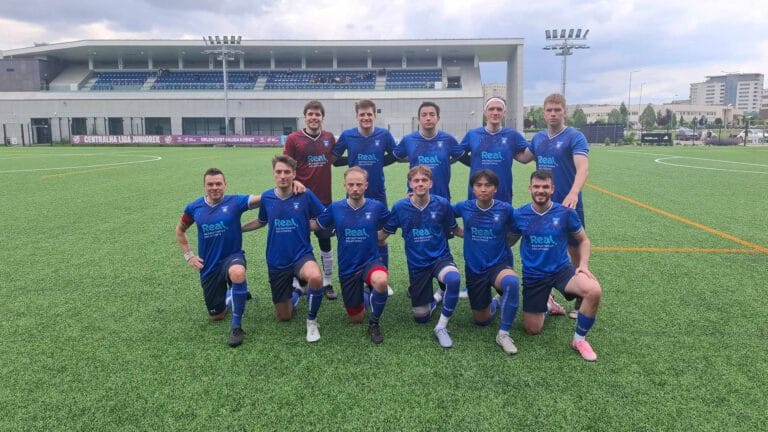 Krakow Dragoons FC players posing for a pre-match photo