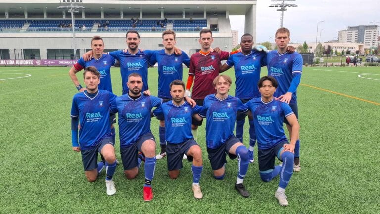 Krakow Dragoons FC players posing for a pre-match photo