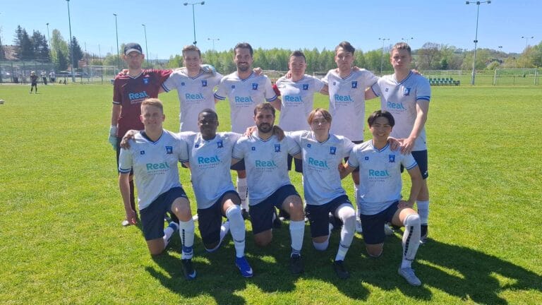 Krakow Dragoons FC players posing for a pre-match photo